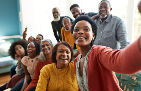 Large Family Posing for Selfie at Party