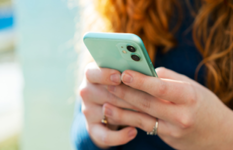 Person Using Mobile Phone for 2-Step Verification