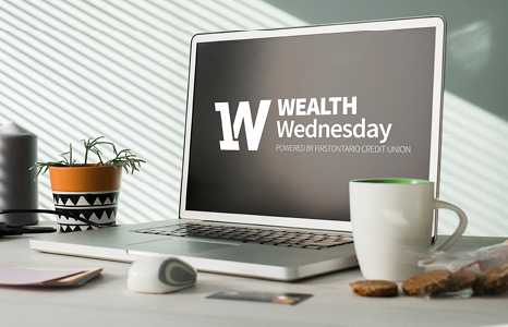 Laptop with Wealth Wednesday Logo on Screen