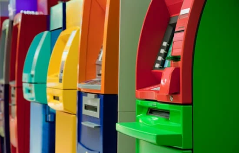 Row of Colorful ATMs