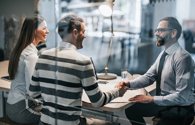 Couple Discussing RRSP Mutual Fund Options with Financial Advisor